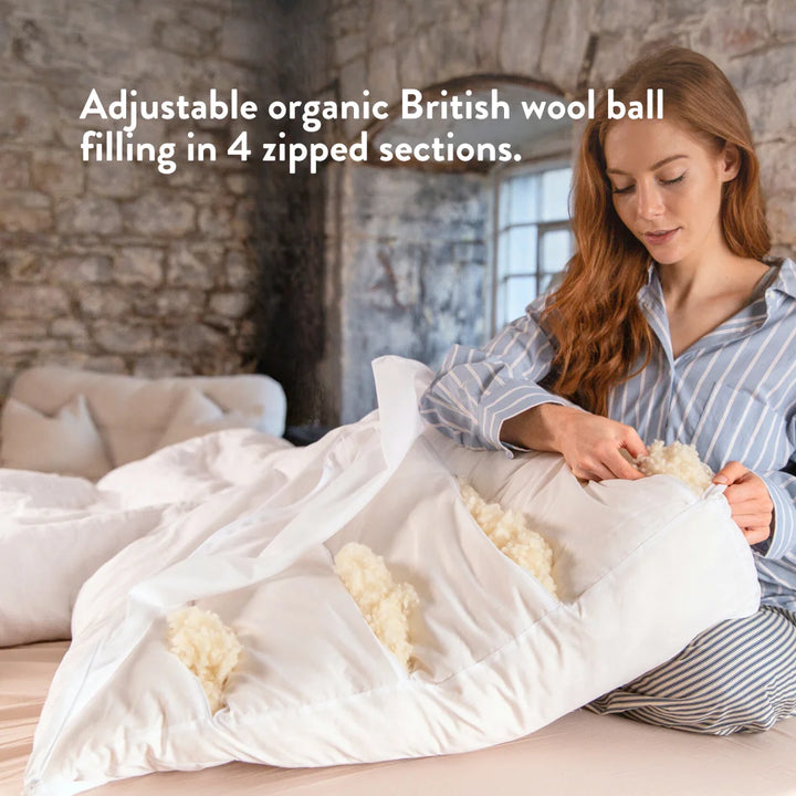 Bed wedge with adjustable organic British wool ball filling in 4 zipped sections.