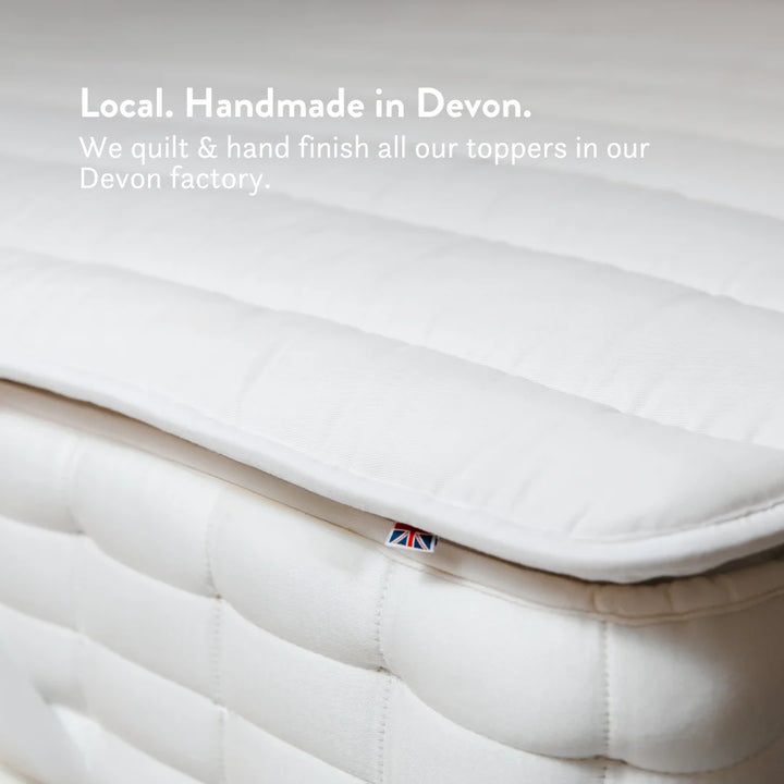 Local. Handmade in Devon. We quilt & hand finish all our toppers in our Devon factory.