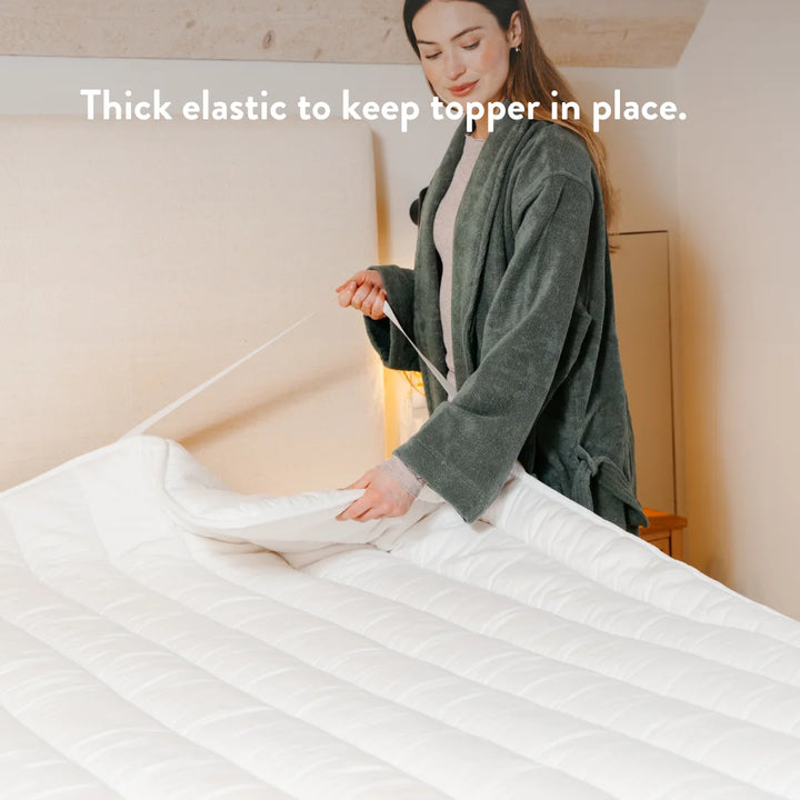 Thick elastic to keep topper in place.