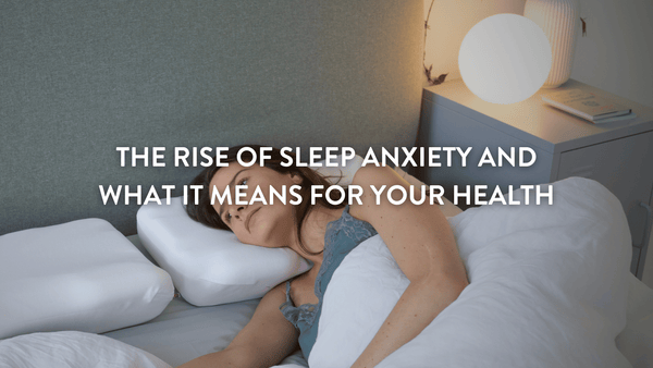 Person lying in bed trying to get to sleep