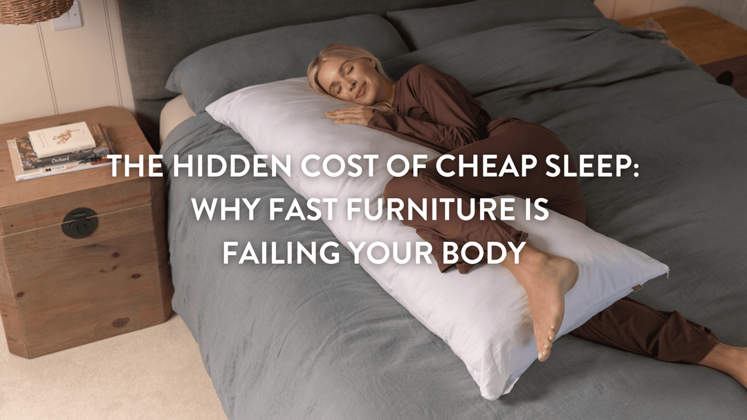 Person sleeping in bed using a Putnams Body Pillow