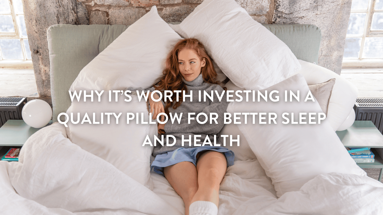woman lying on a double bed surrounded by Putnams pillows 