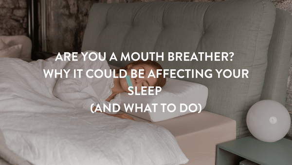 Person sleeping on their side wearing mouth tape whilst sleeping