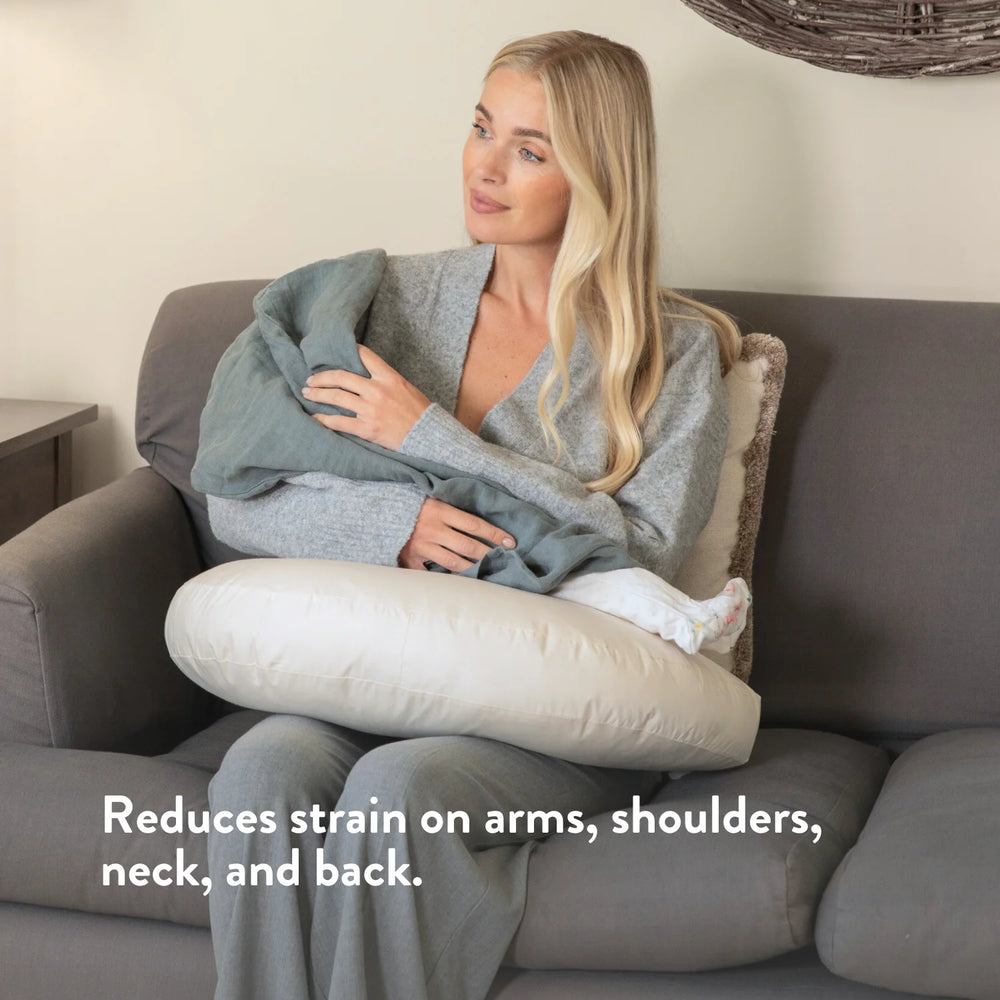 Organic British wool Nursing Pillow - Bottle & Breastfeeding Pillow with unbleached 100% cotton cover and visible zip, placed on a bed OEKOTEX standard 100 natural plastic free