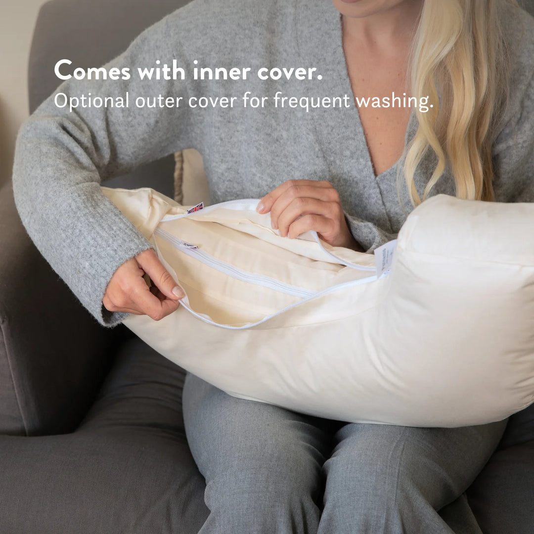 Organic British wool Nursing Pillow - Bottle & Breastfeeding Pillow with unbleached 100% cotton cover and visible zip, placed on a bed OEKOTEX standard 100 natural plastic free