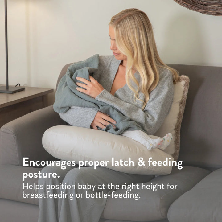 Organic British wool Nursing Pillow - Bottle & Breastfeeding Pillow with unbleached 100% cotton cover and visible zip, placed on a bed OEKOTEX standard 100 natural plastic free