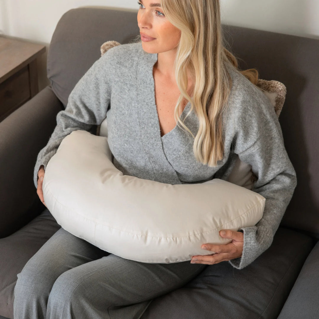 Organic British wool Nursing Pillow - Bottle & Breastfeeding Pillow with unbleached 100% cotton cover and visible zip, placed on a bed OEKOTEX standard 100 natural plastic free