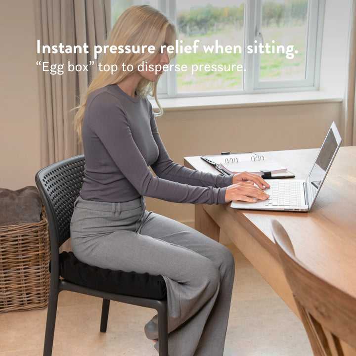 Sero Pressure Cushion Coccyx Cut Out - For tailbone pain and coccydynia. Discreet stretch cover available in different sizes and thicknesses. Handmade in the UK. 2 year guarantee.