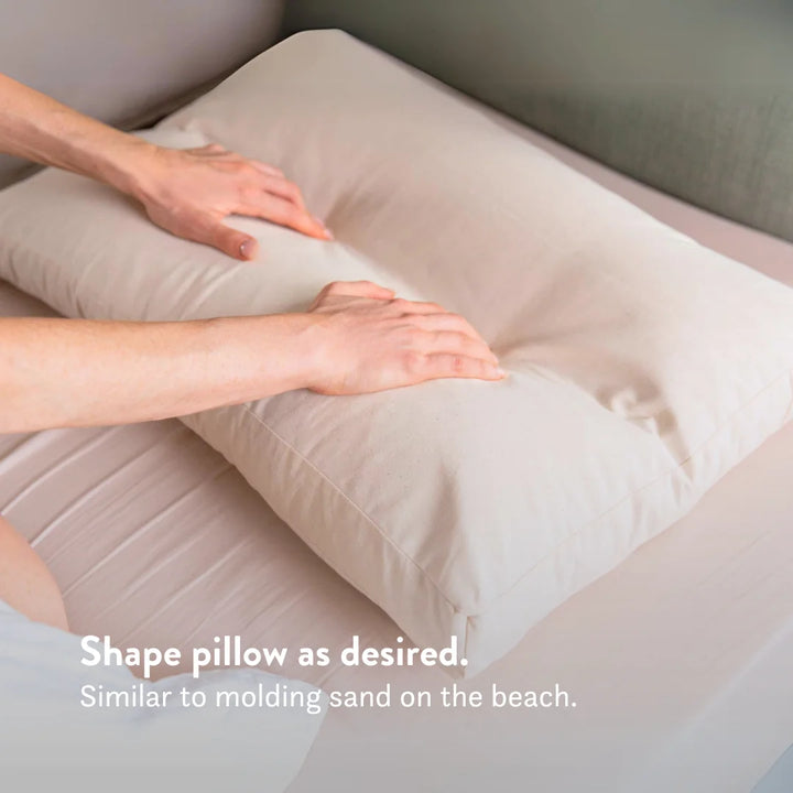 Pillow that feels and can be shaped like sand. Buckwheat hull filling. Cotton cover.